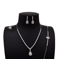 Sterling Silver Pear‑Shaped Halo Bridal Set with Flower Cluster Chain image